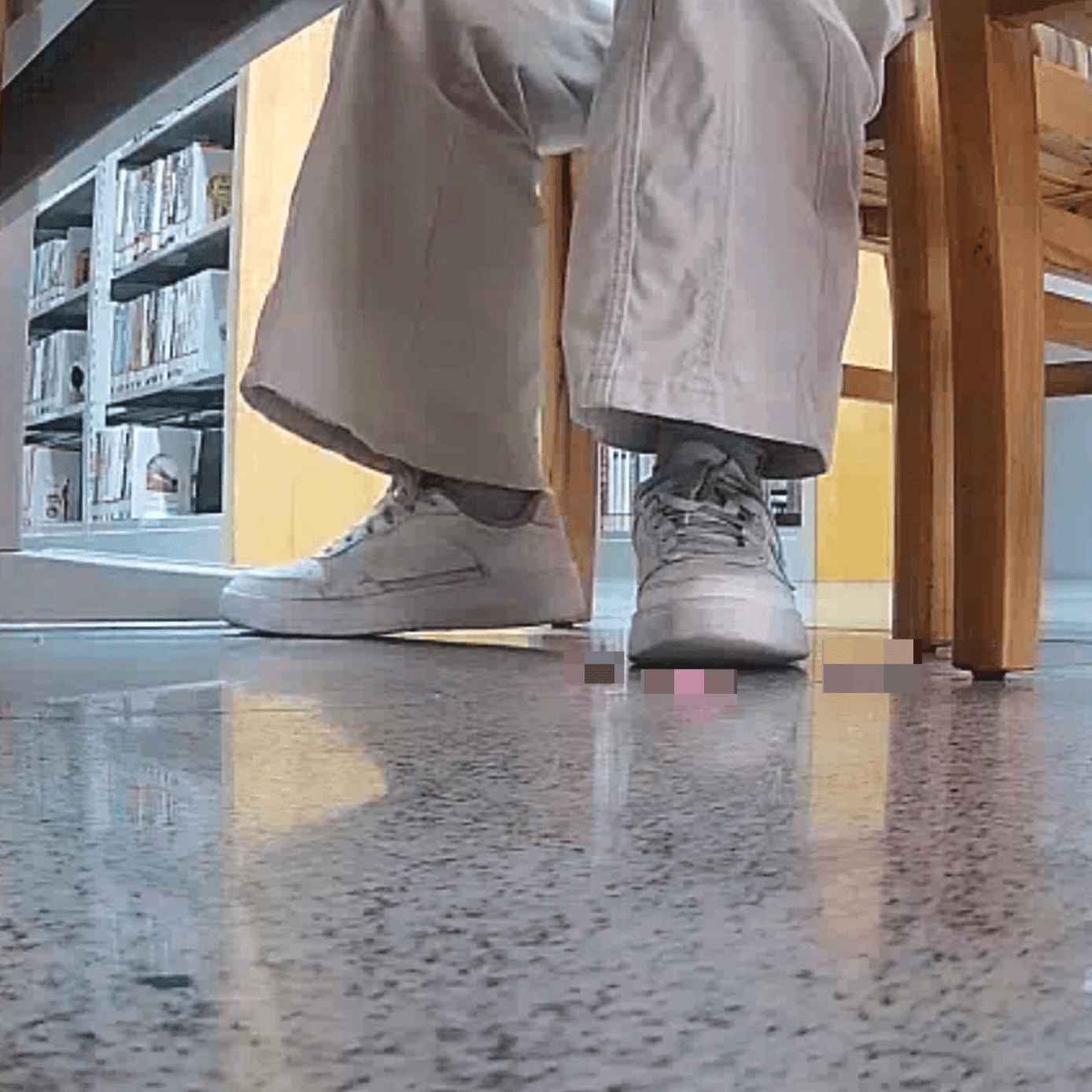 Woman candid crush with white sneakers at the library