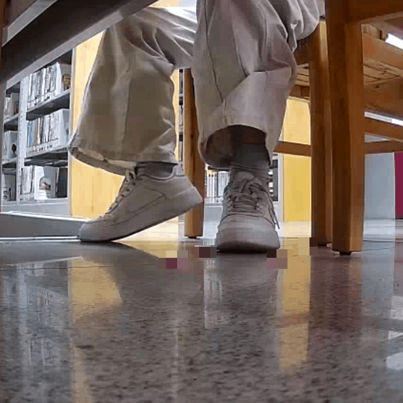 Woman candid crush with white sneakers at the library
