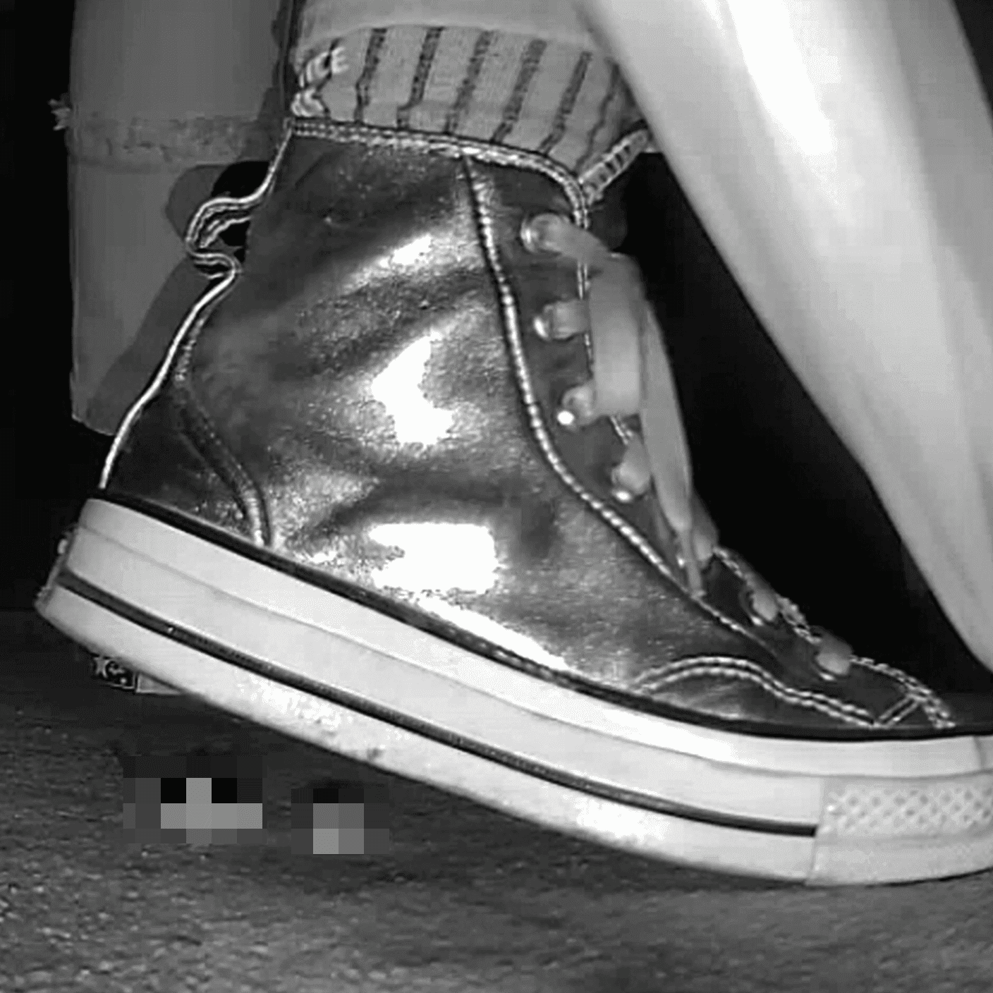 Woman in silver Converse candid crush at the cinema