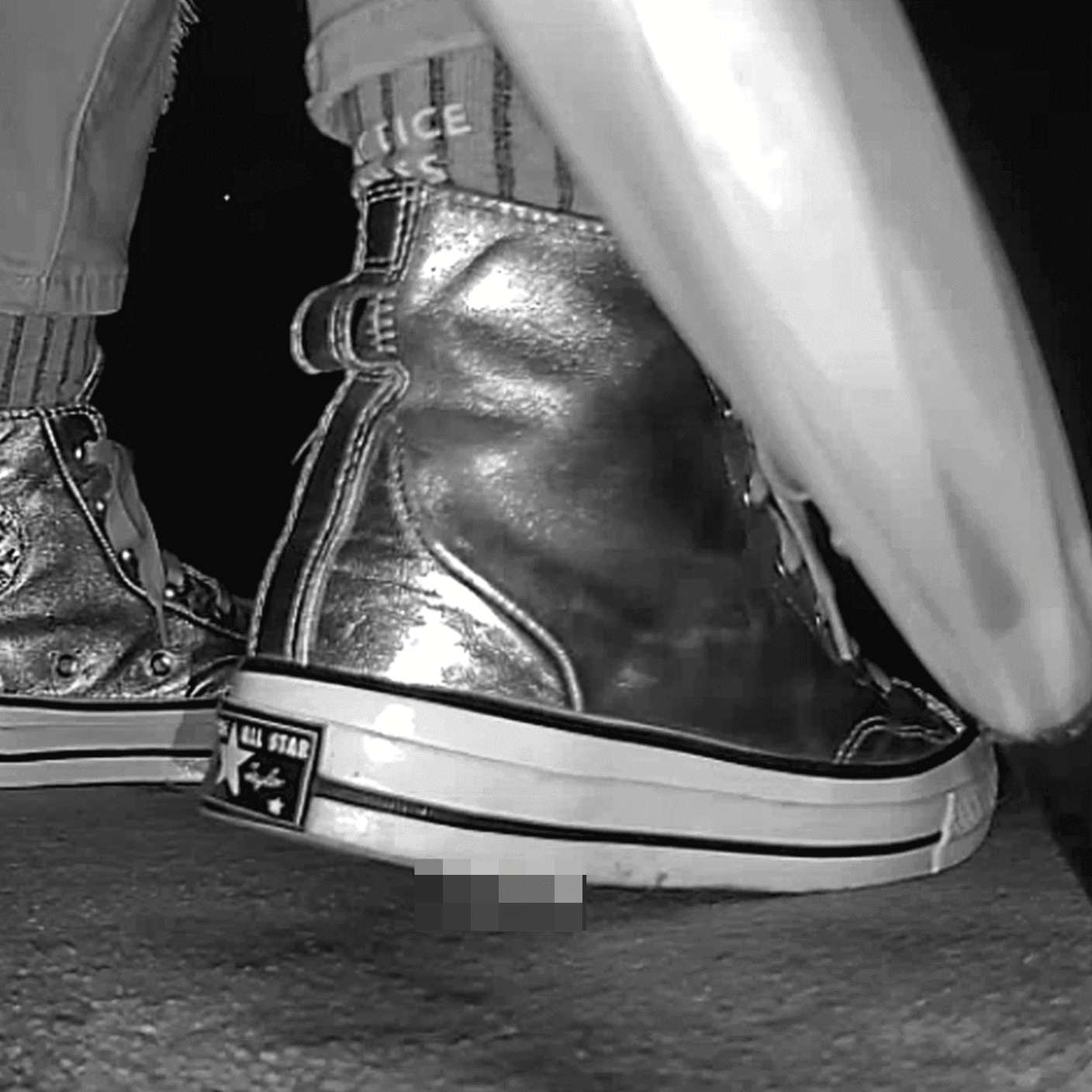 Woman in silver Converse candid crush at the cinema