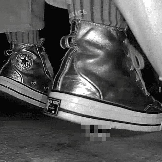 Woman in silver Converse candid crush at the cinema