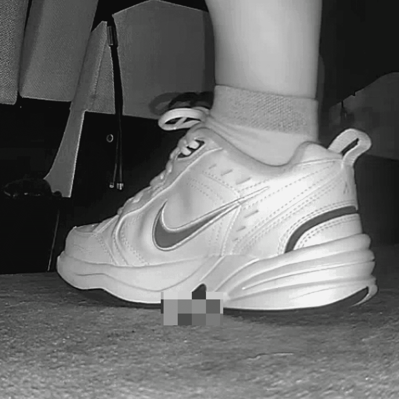 Woman in Nike Air sneakers candid crush at the cinema