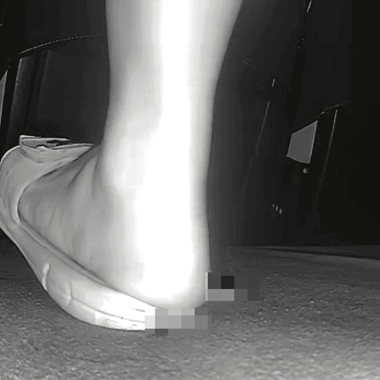 Woman in slippers shaking her leg candid crush at the cinema