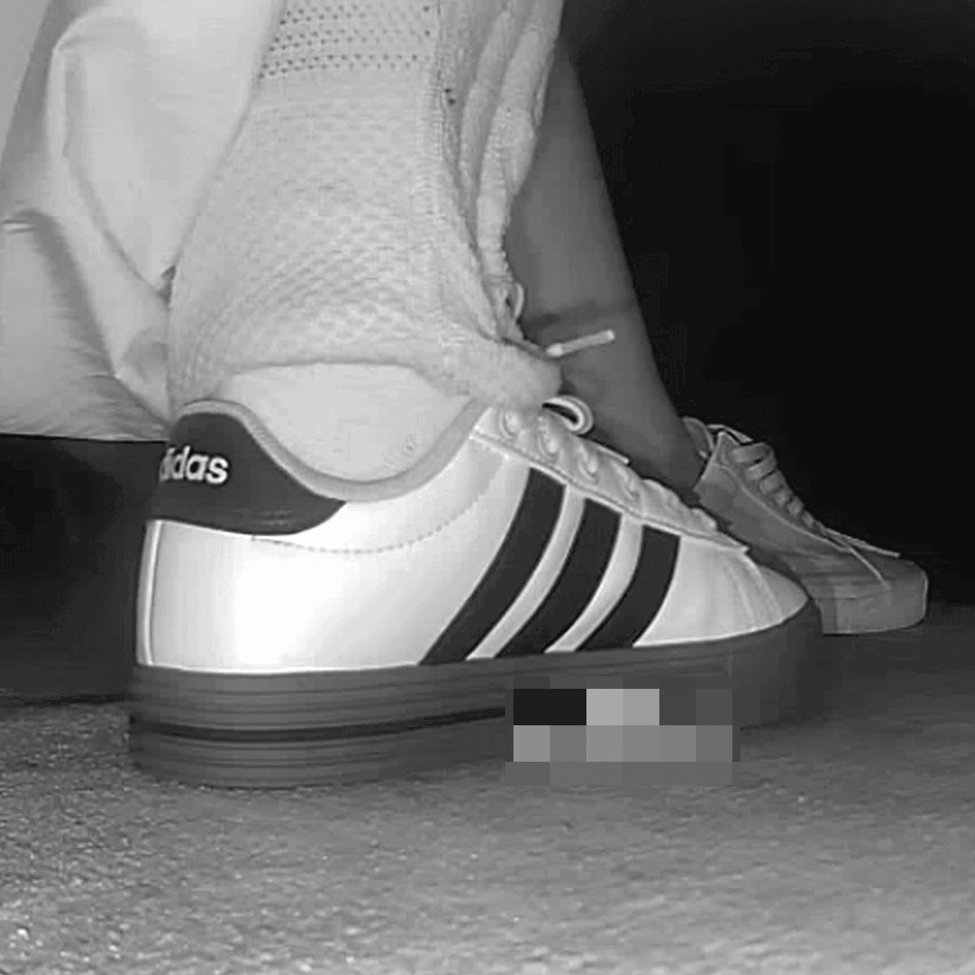 Cinema woman in a dress and Adidas sleek shoes candid crush