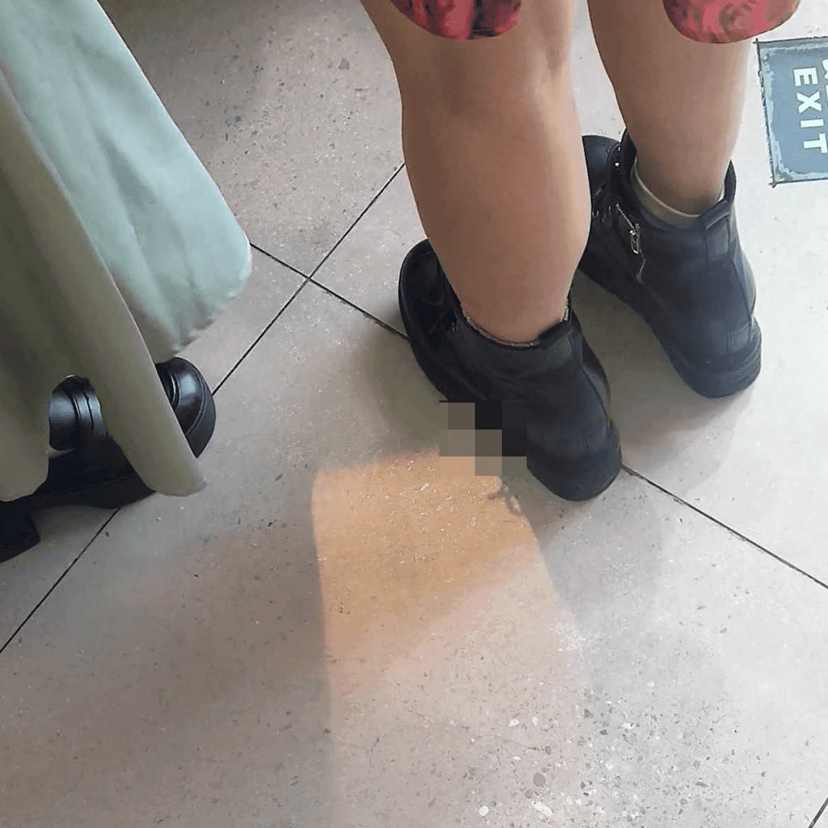 Game arcade woman candid crush with chunky heeled leather shoes and Martin boots