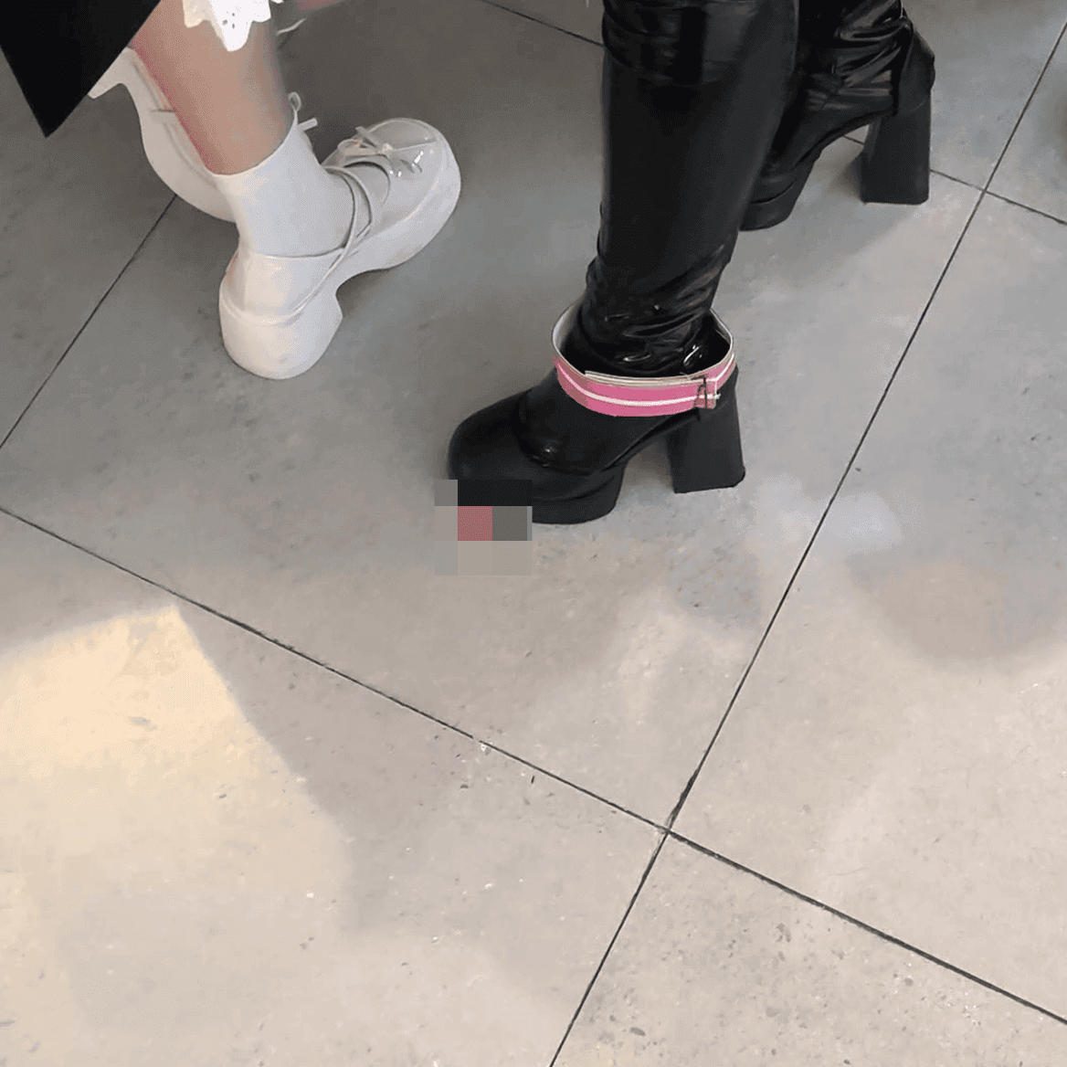 Game arcade woman candid crush with chunky heeled leather shoes and Martin boots