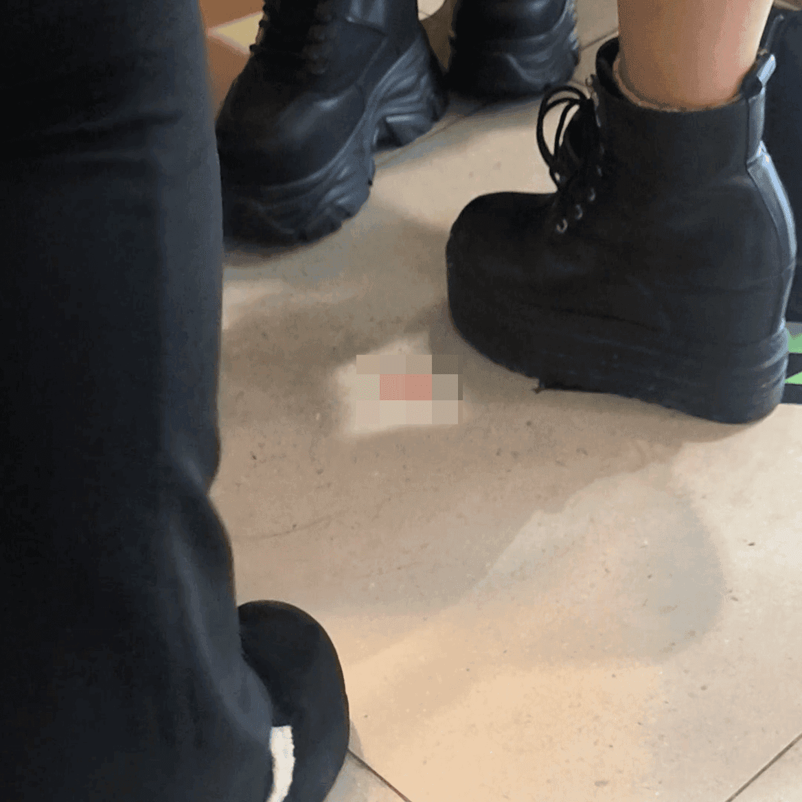 Game arcade woman candid crush with chunky heeled leather shoes and Martin boots