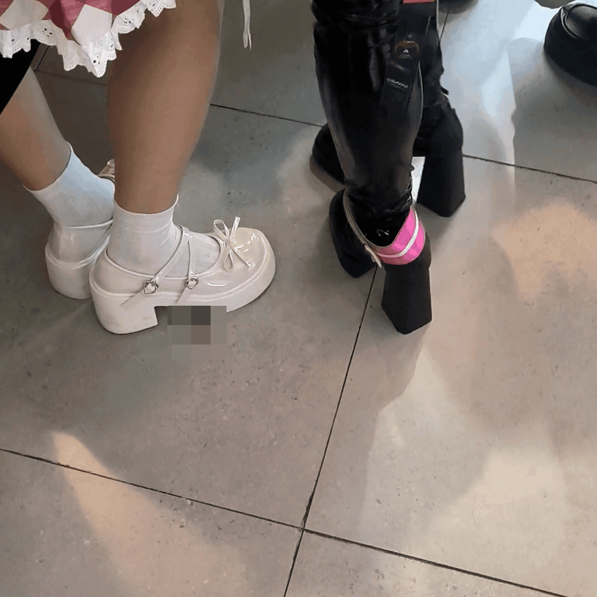 Game arcade woman candid crush with chunky heeled leather shoes and Martin boots