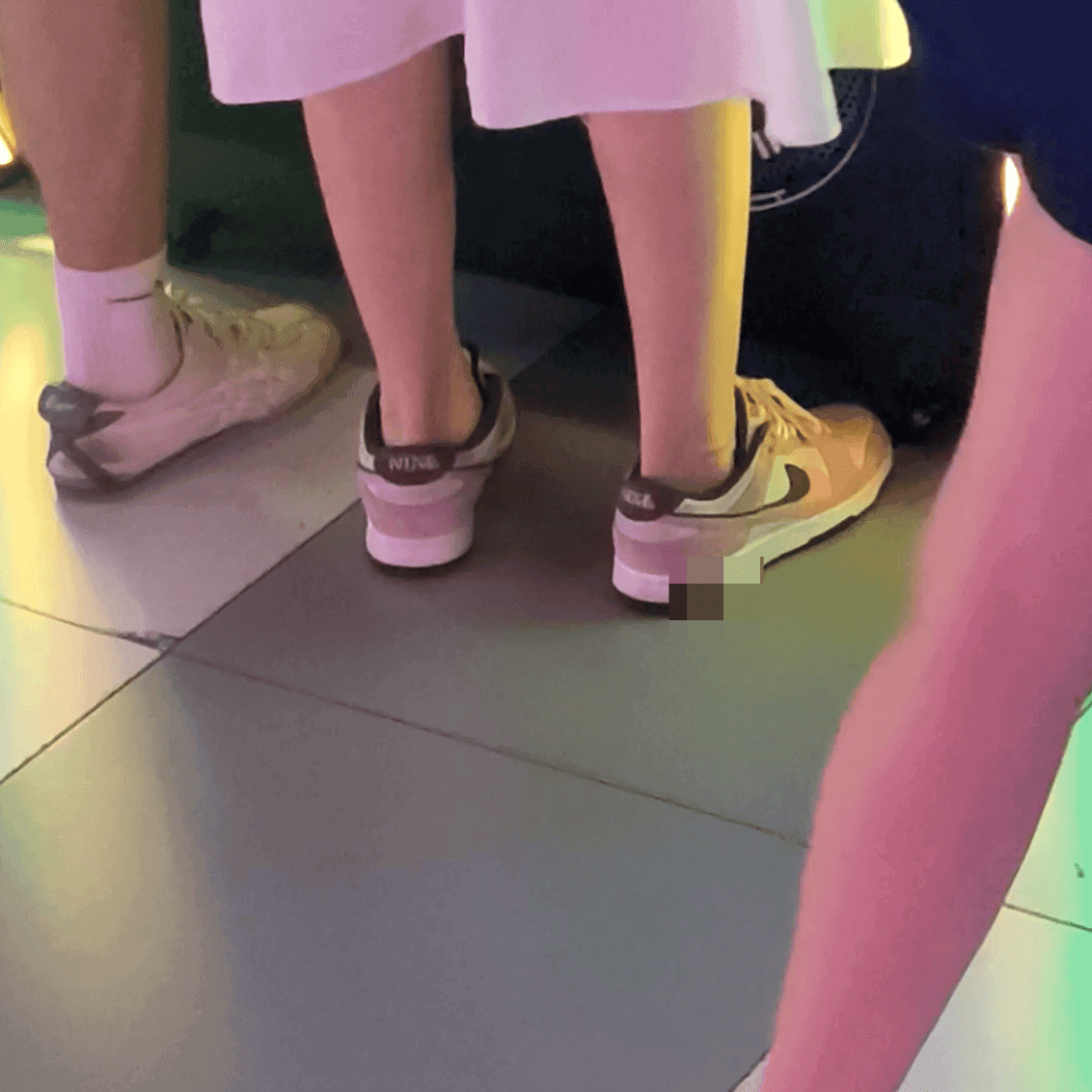 Game arcade dance machine and basketball shooting game woman candid crush with sneakers