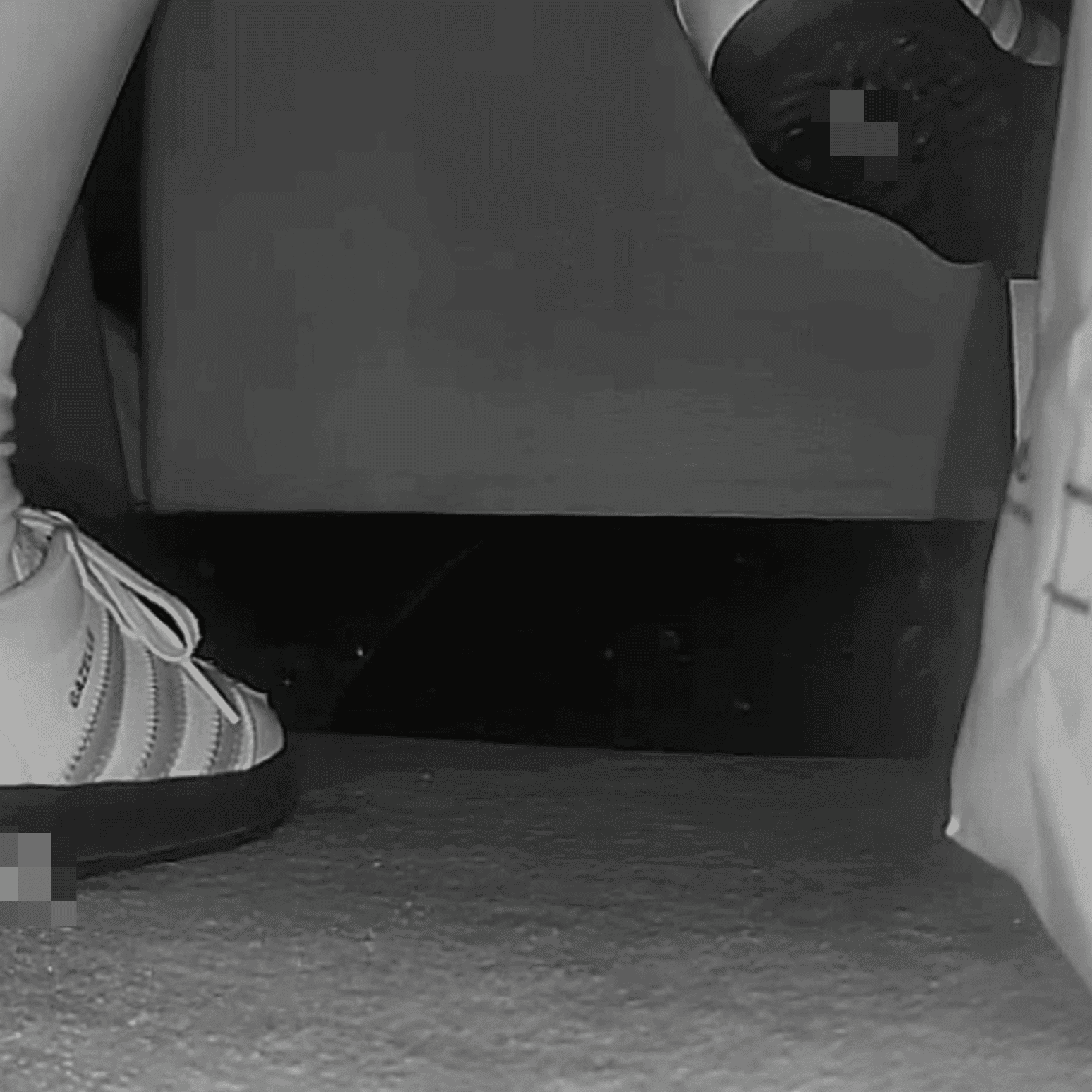 Woman in cinema candid crush with Adidas Samba sneakers