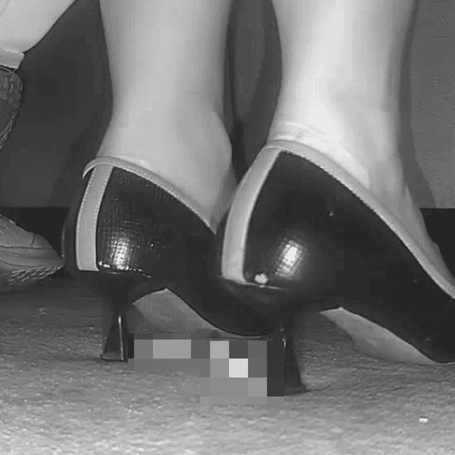 Woman in cinema wearing high heels candid crush