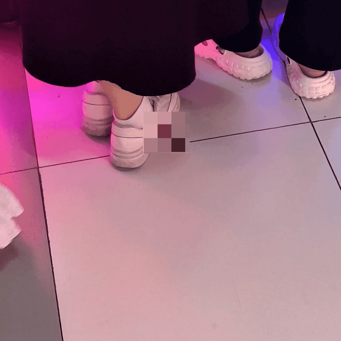 Game arcade woman in a dress candid crush with leather shoes + flats and stuck to soles