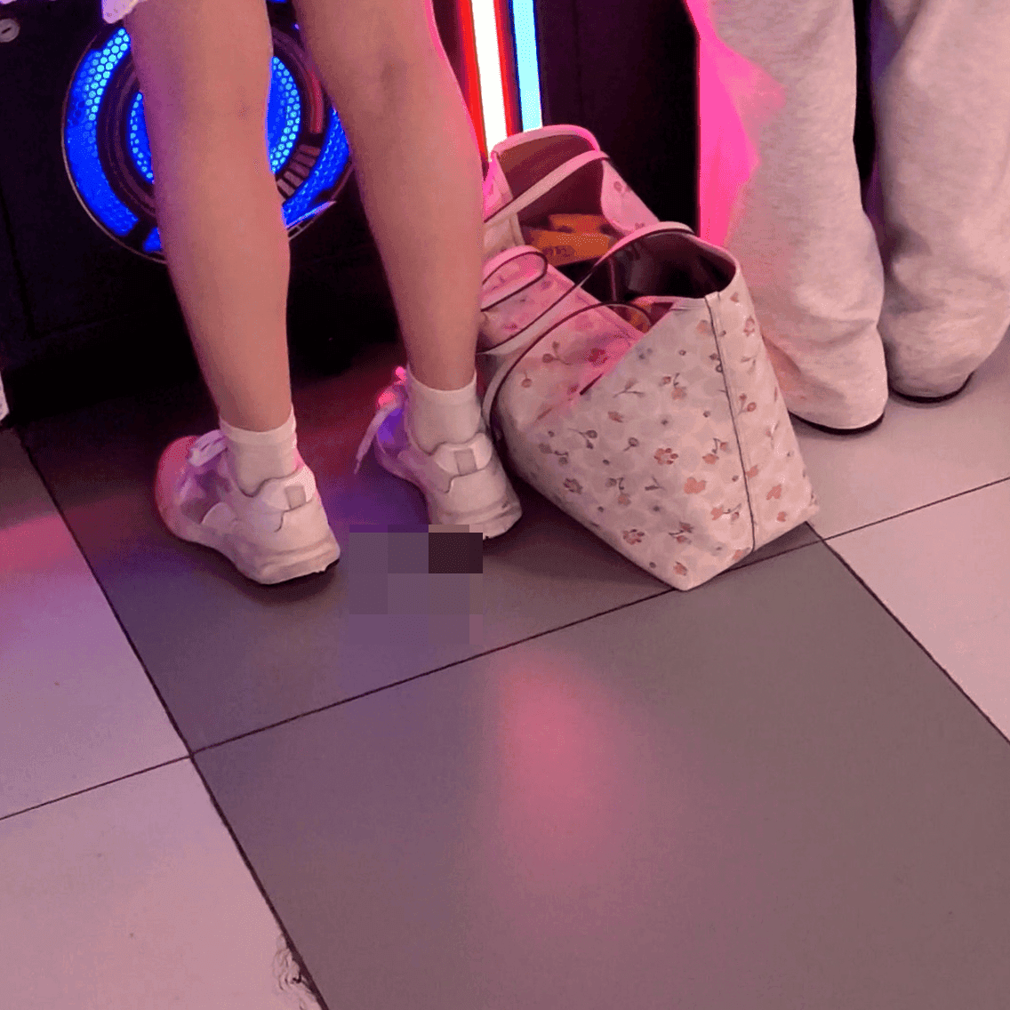 Game arcade woman in a dress candid crush with leather shoes + flats and stuck to soles