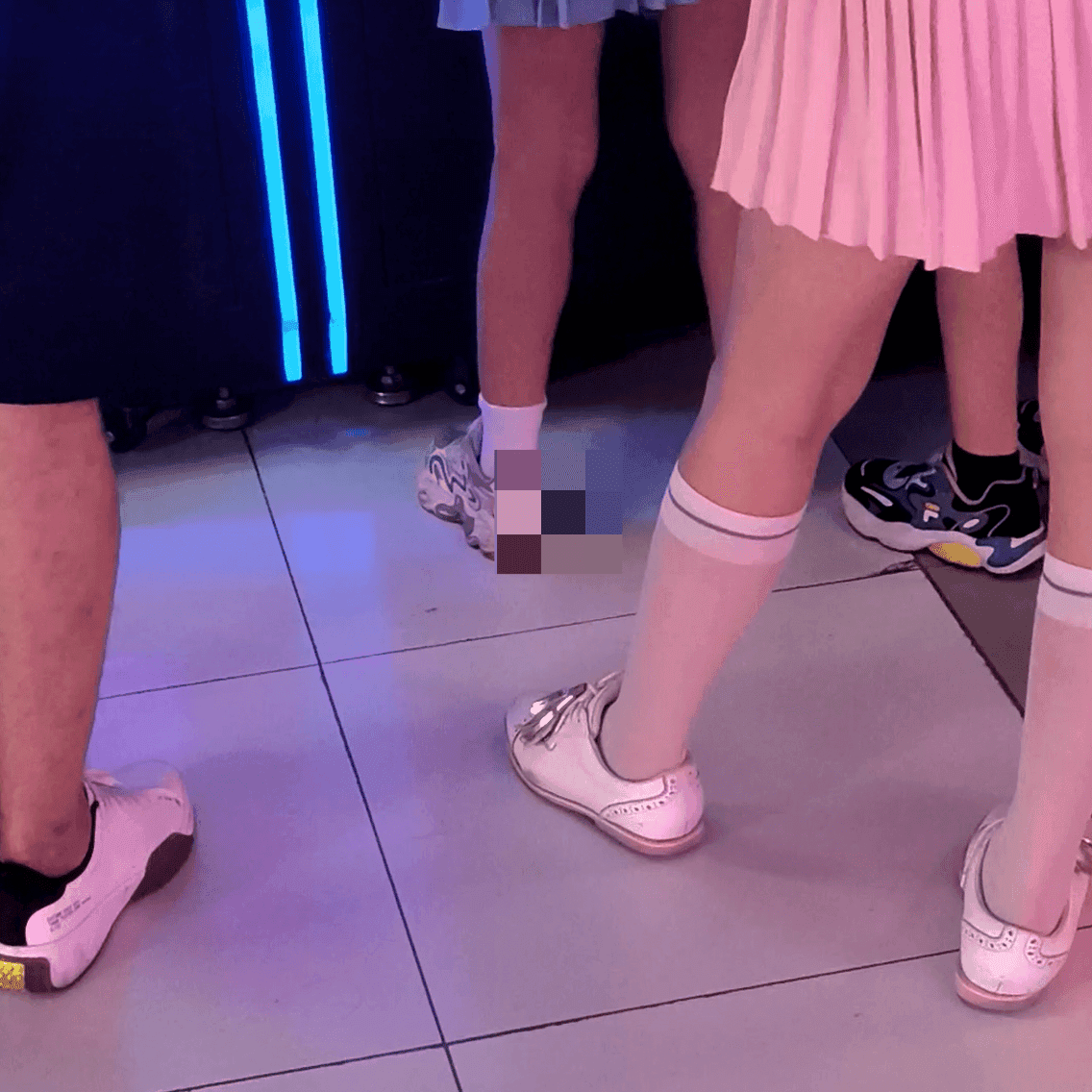 Game arcade woman in a dress candid crush with leather shoes + flats and stuck to soles