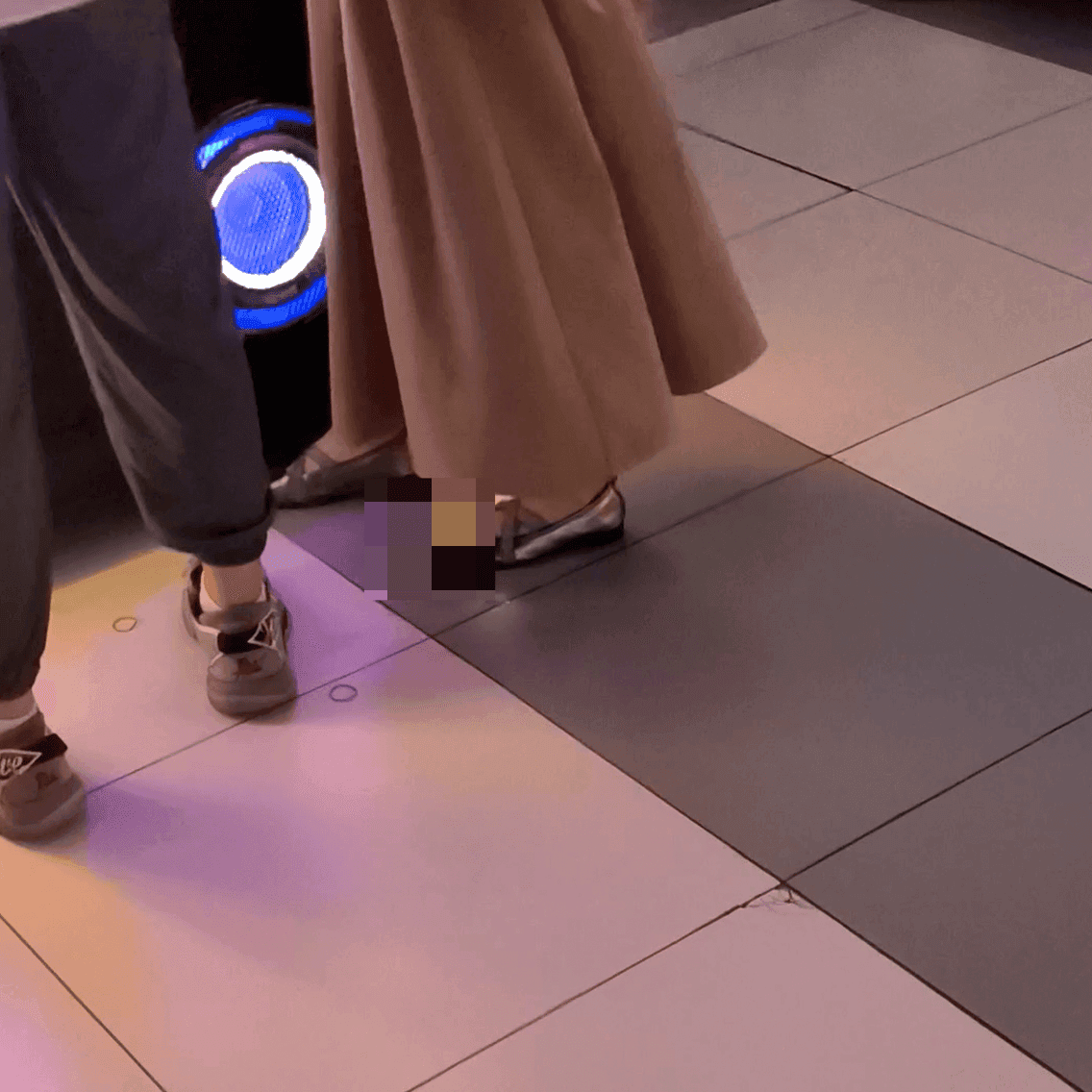 Game arcade woman in a dress candid crush with leather shoes + flats and stuck to soles
