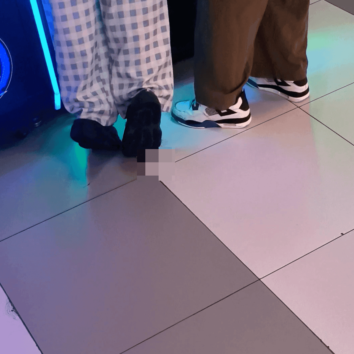 Game arcade woman repeatedly candid crush with sneakers and leather shoes while playing the basketball shooting game