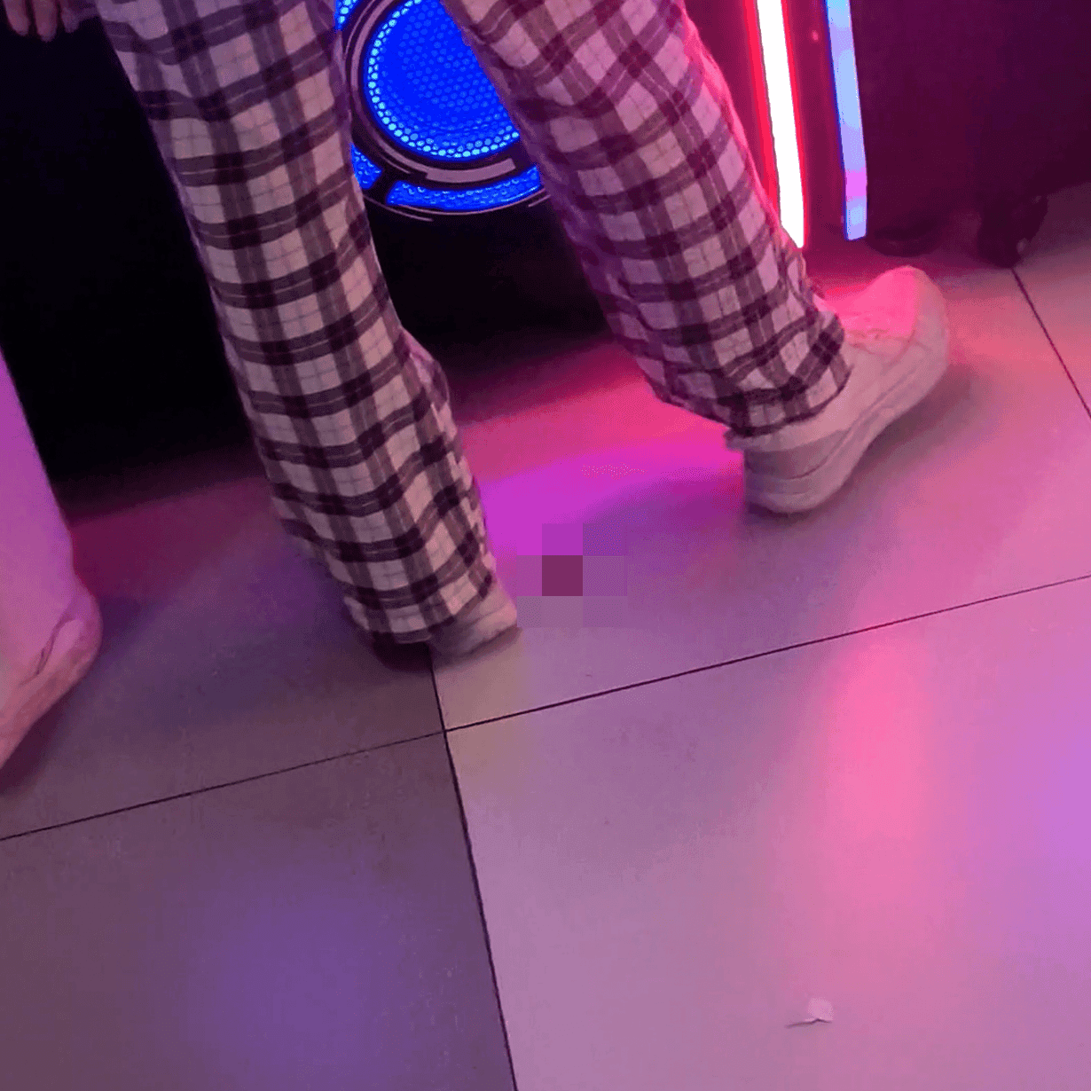 Game arcade woman repeatedly candid crush with sneakers and leather shoes while playing the basketball shooting game