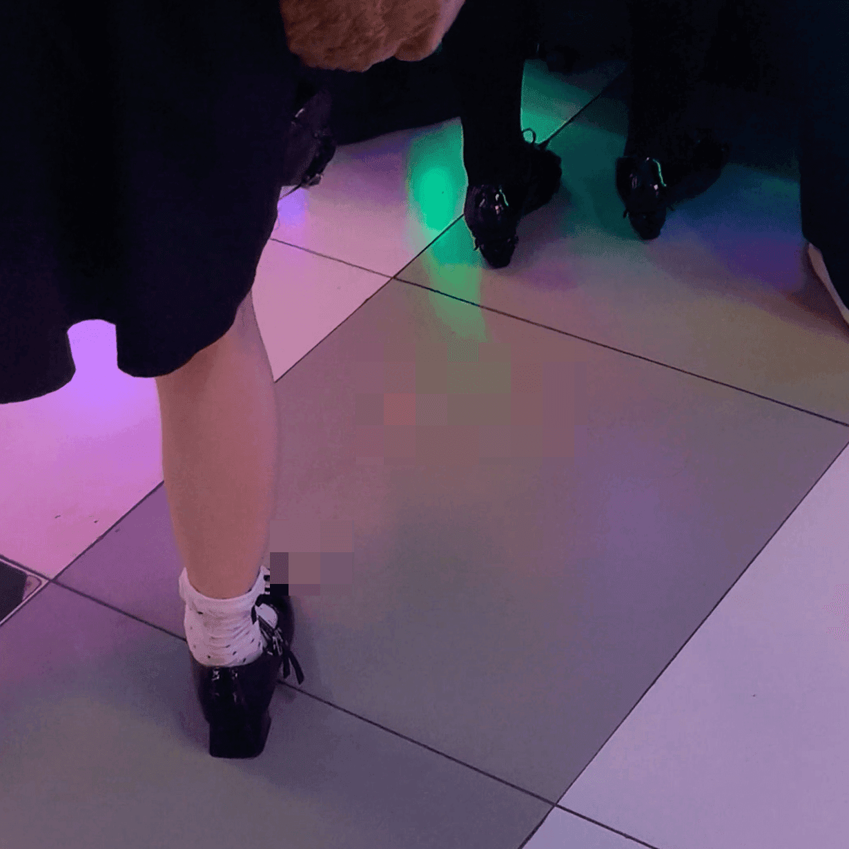 Game arcade woman repeatedly candid crush with sneakers and leather shoes while playing the basketball shooting game