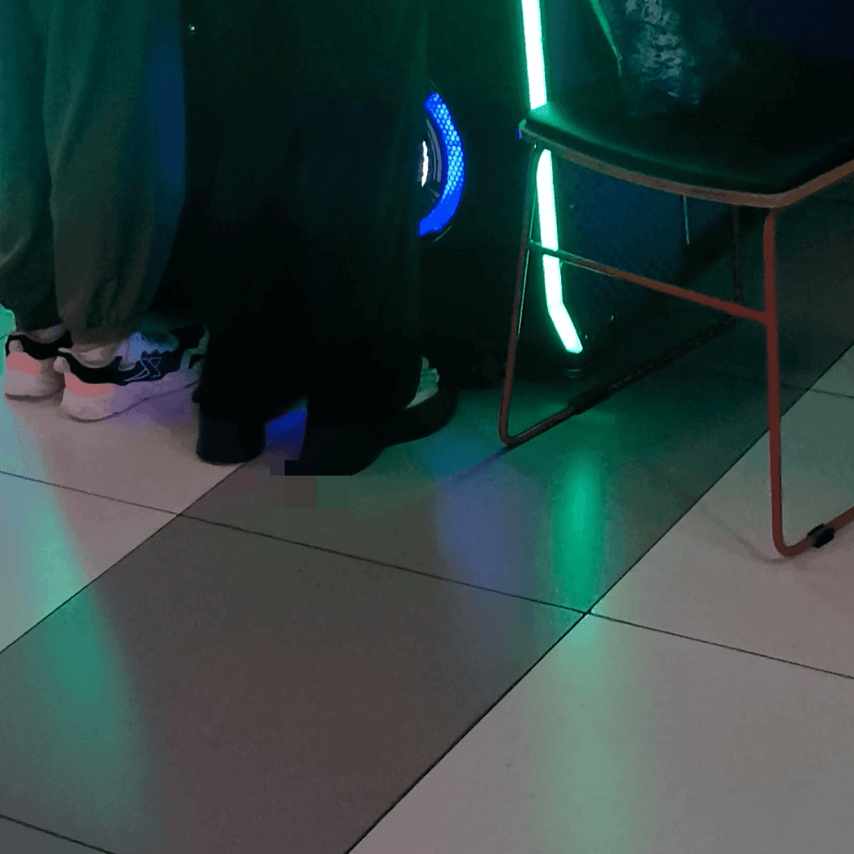 Game arcade woman repeatedly candid crush with sneakers and leather shoes while playing the basketball shooting game