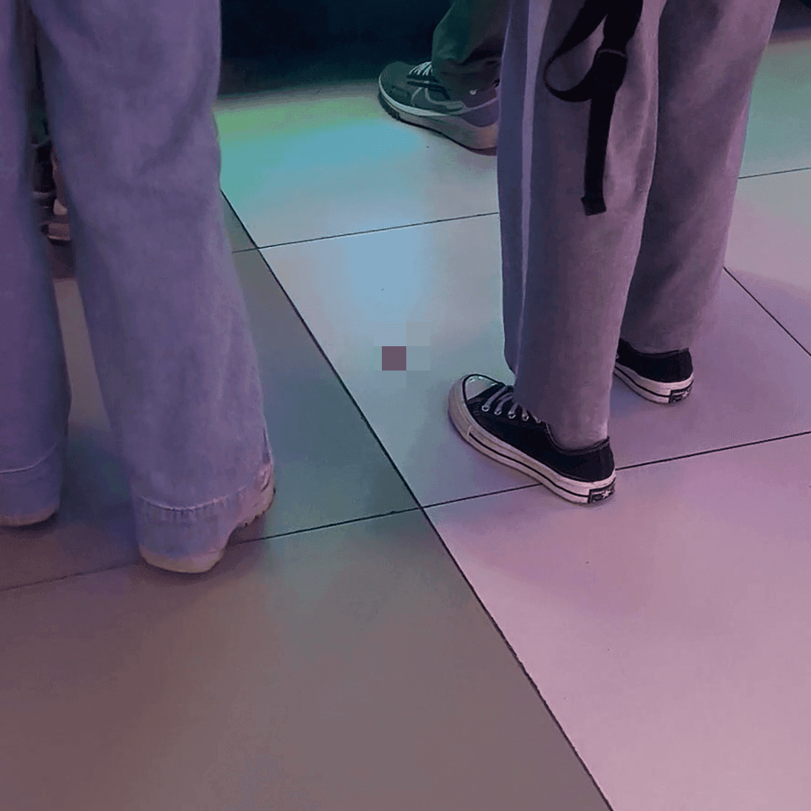 Game arcade woman candid crush with Converse shoes and stiletto heels while playing the basketball shooting machines