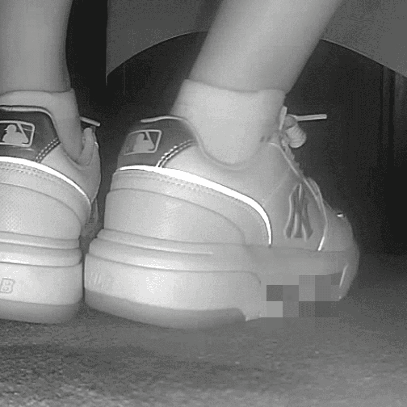 Lady in white socks and MLB chunky sneakers candid crush at cinema