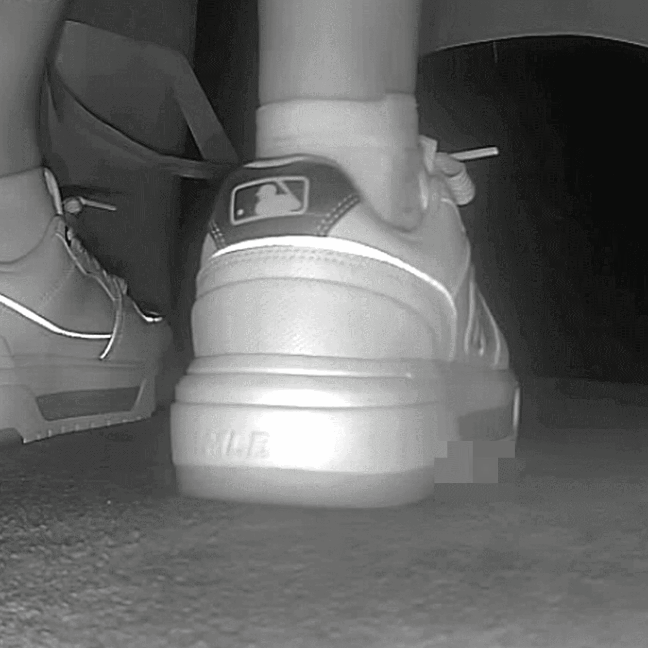 Lady in white socks and MLB chunky sneakers candid crush at cinema
