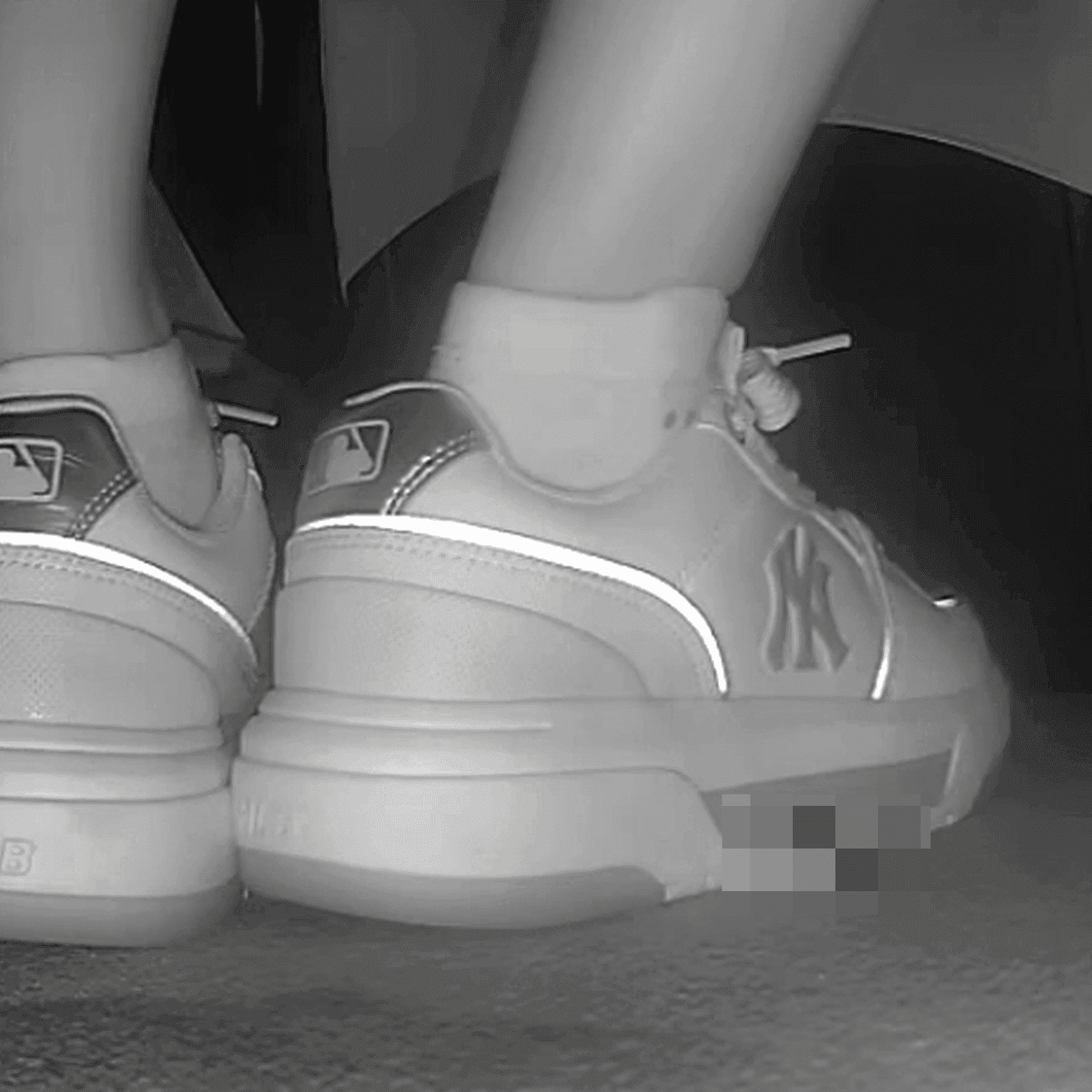 Lady in white socks and MLB chunky sneakers candid crush at cinema