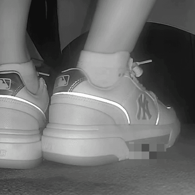 Lady in white socks and MLB chunky sneakers candid crush at cinema