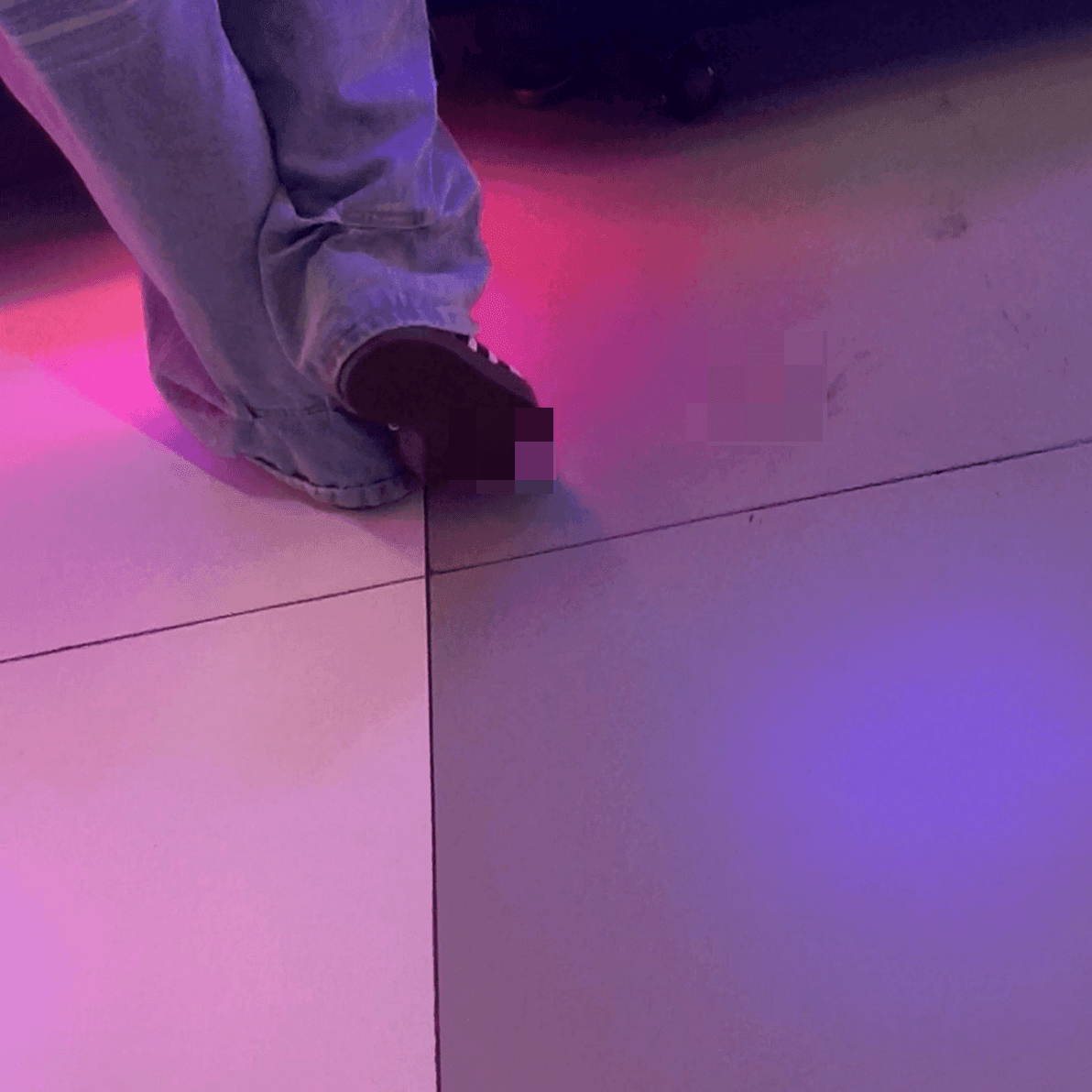 Game arcade lady in sneakers and leather shoes candid crush and stuck to soles