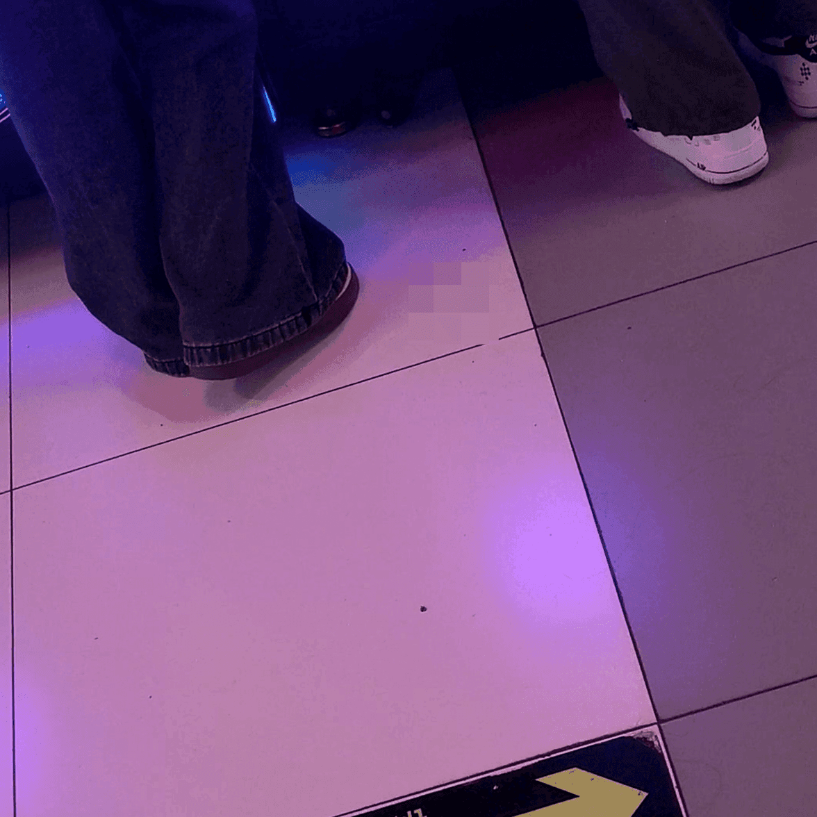 Game arcade lady in sandals and leather shoes candid crush and stuck to soles
