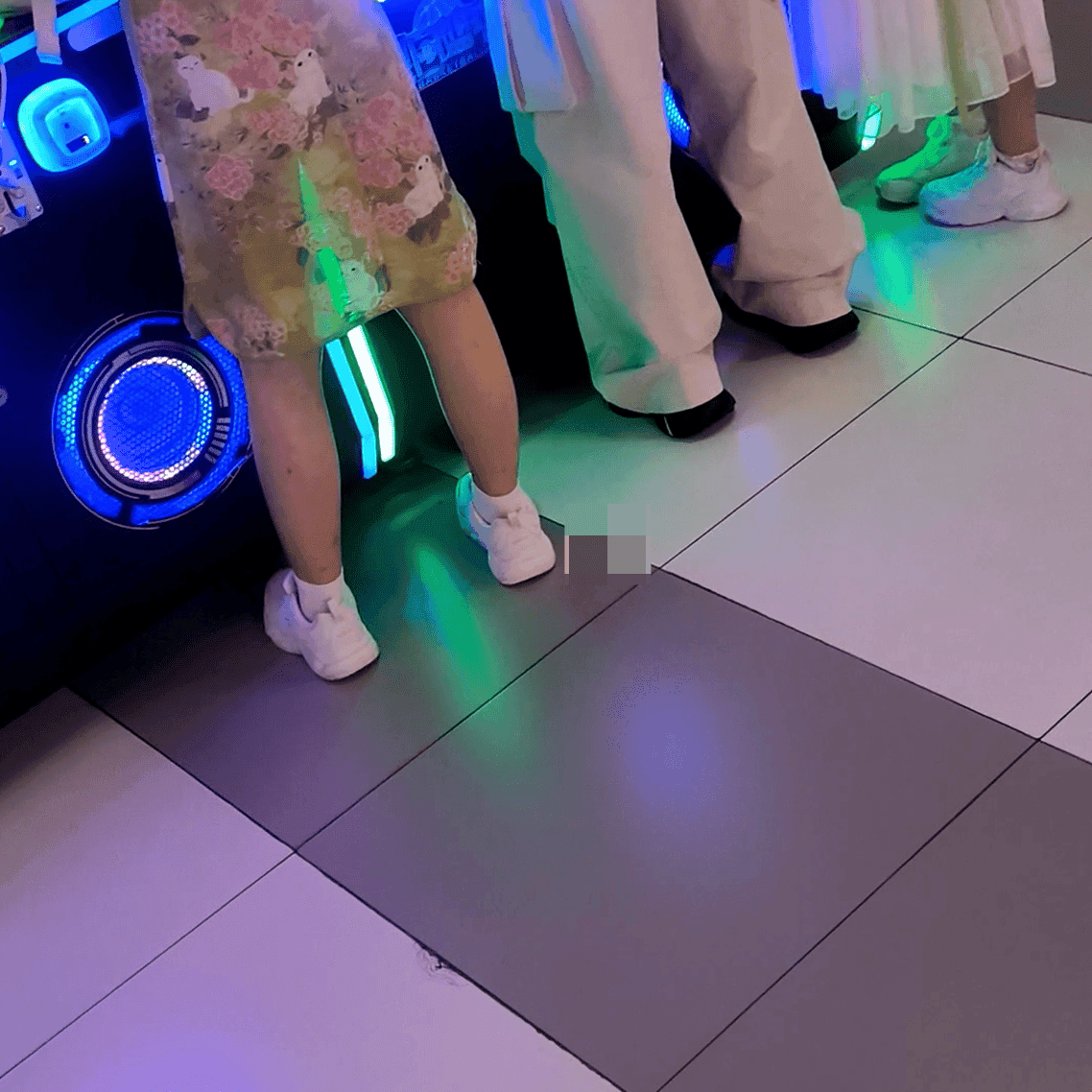 Game arcade young lady in sneakers candid crush and rub