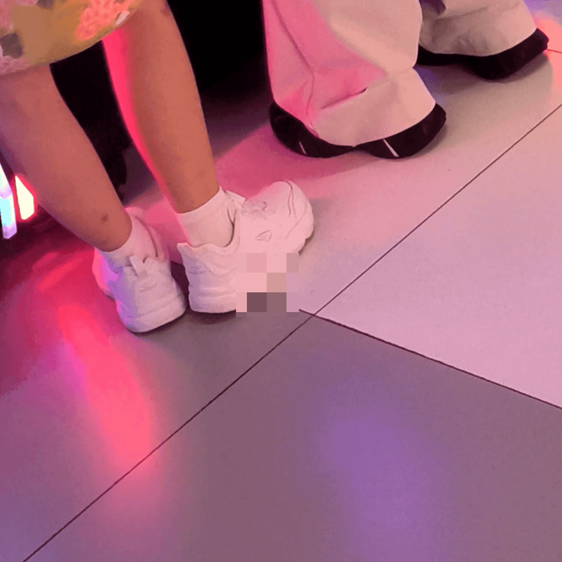 Game arcade young lady in sneakers candid crush and rub
