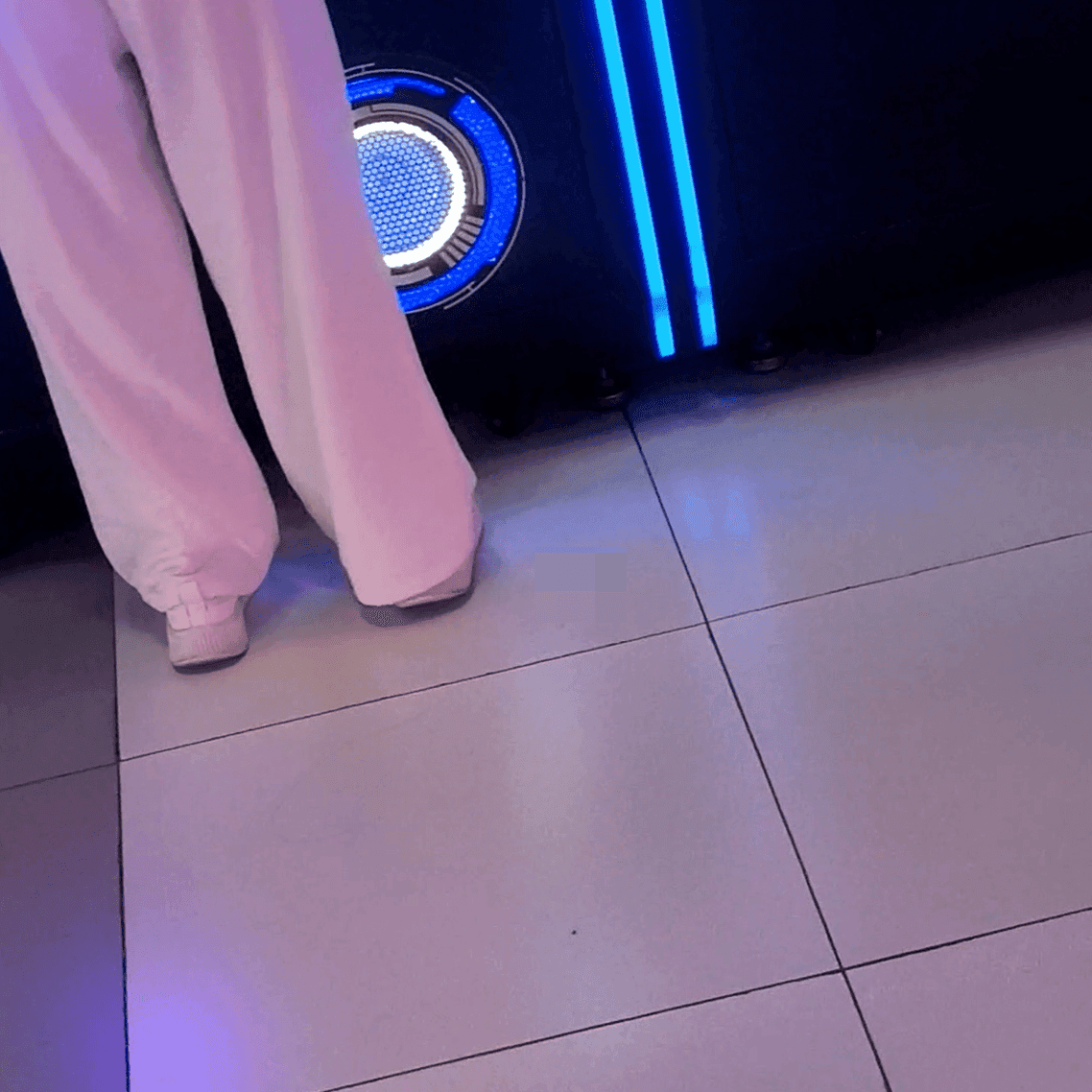 Game arcade young lady in sneakers candid crush and rub