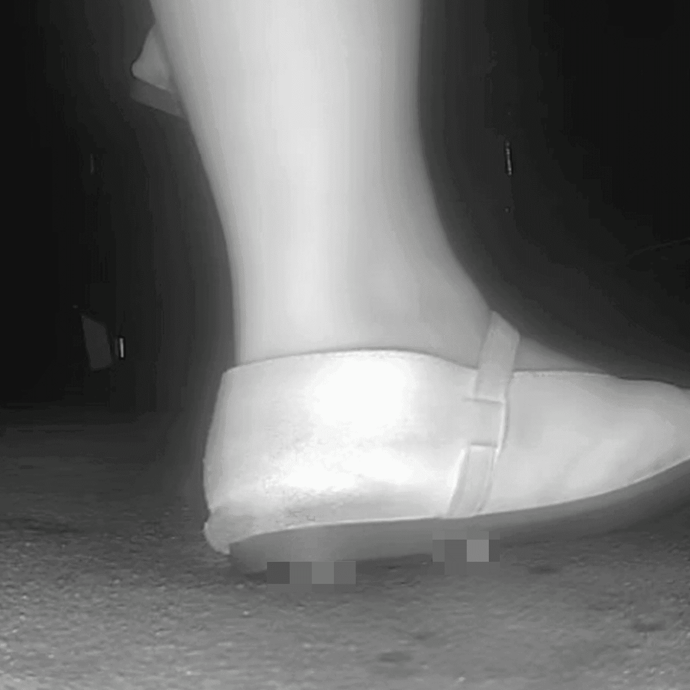 Woman candid crush with flat shoes at the cinema