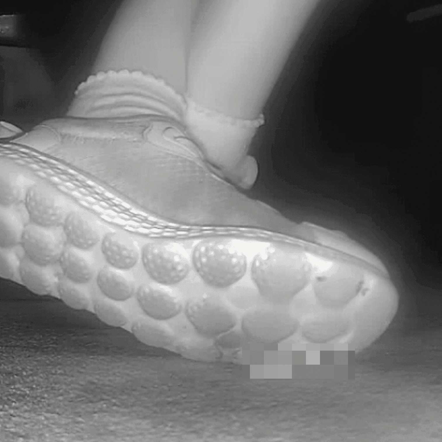 Young lady in sneakers candid crush at the cinema