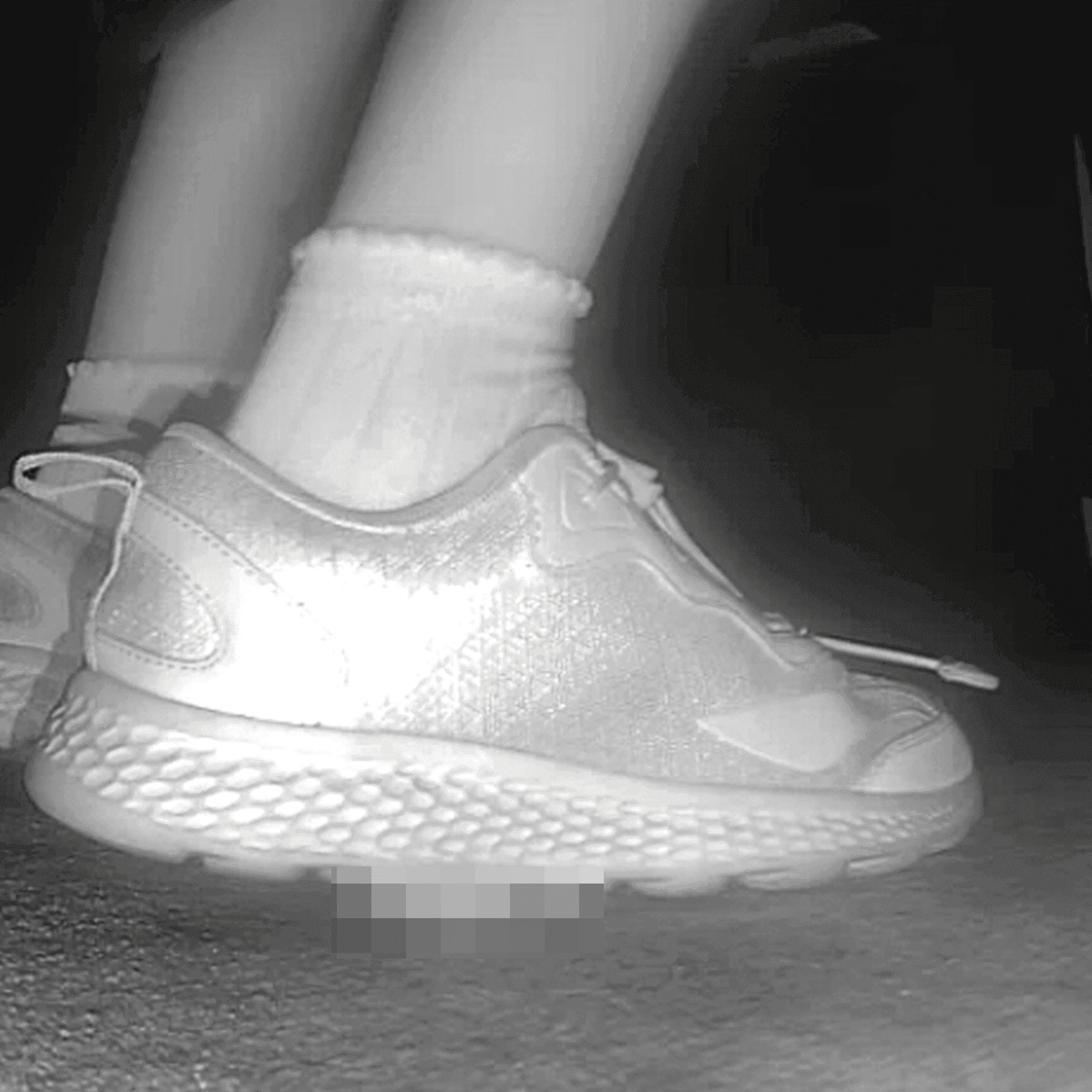 Young lady in sneakers candid crush at the cinema
