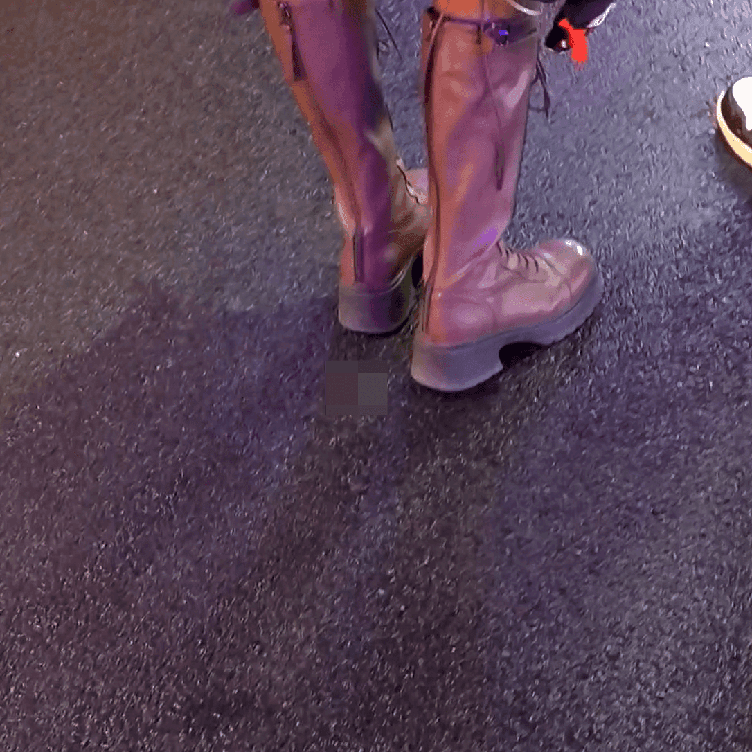 Outdoor plaza women in boots and leather shoes candid crush