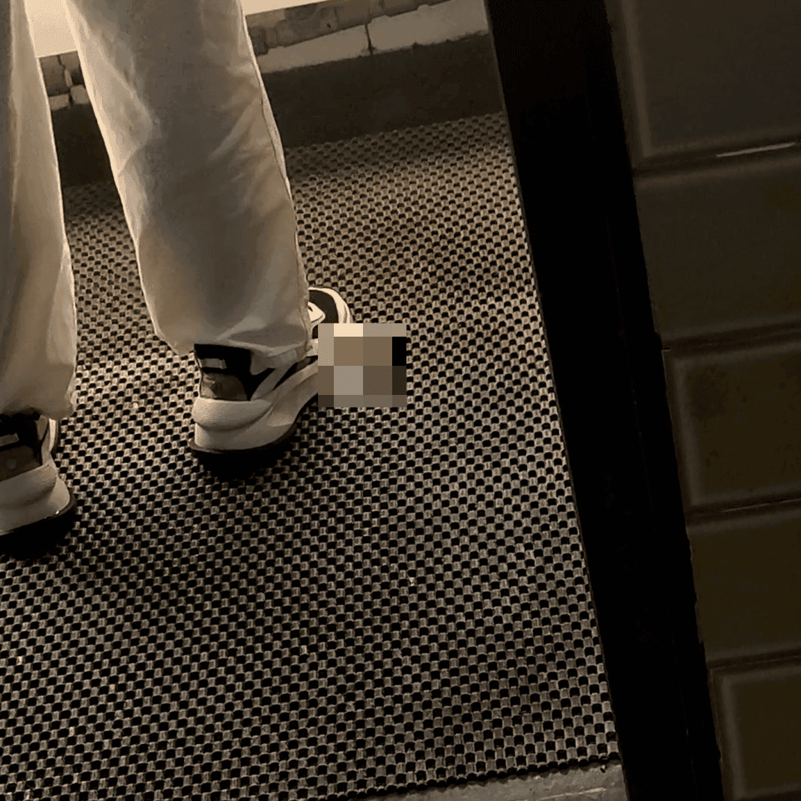 Multiple women in sneakers candid crush at the women's restroom entrance