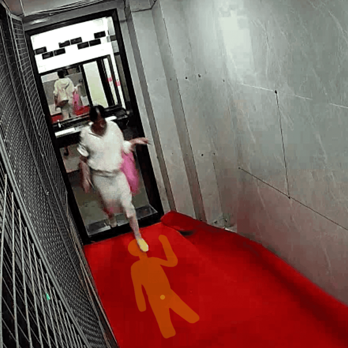 Candid trample on foam mats in the women's restroom corridor