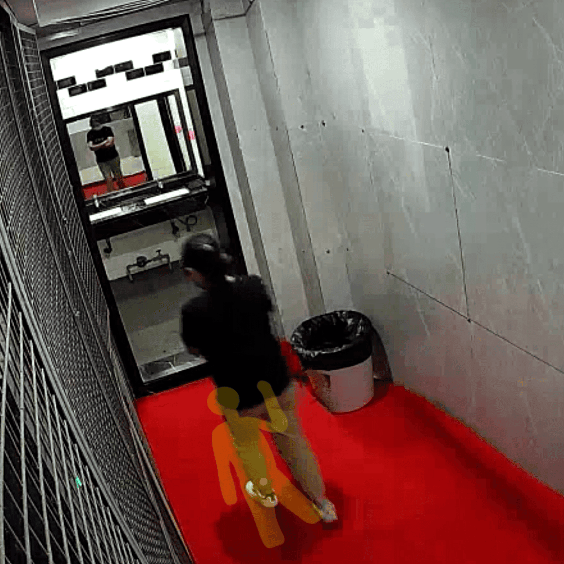 Candid trample on foam mats in the women's restroom corridor