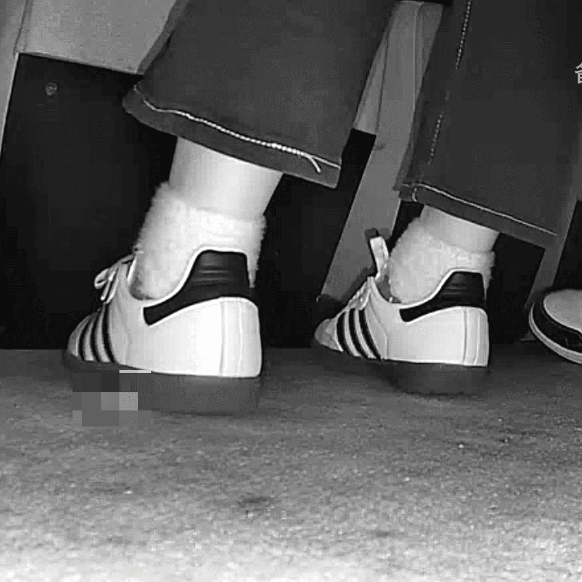 Woman in Adidas Samba candid crush at the cinema