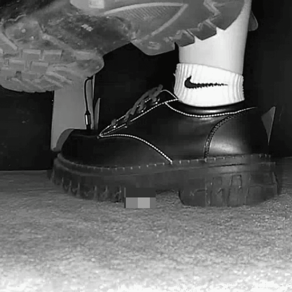 Girl wearing white socks and leather shoes with her boyfriend candid crush at the cinema