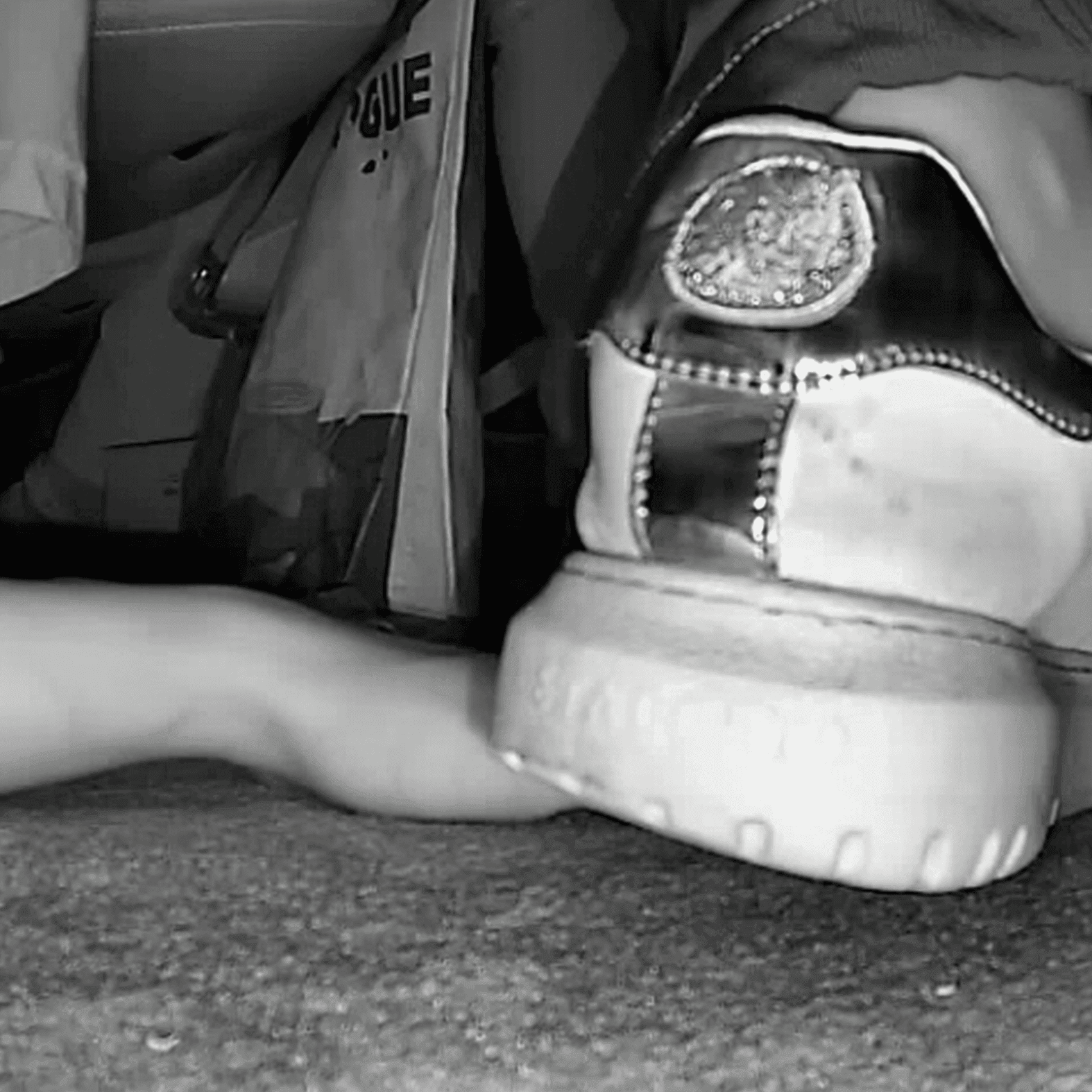 Girl in movie theater candid trample on hand with thick-soled sneakers