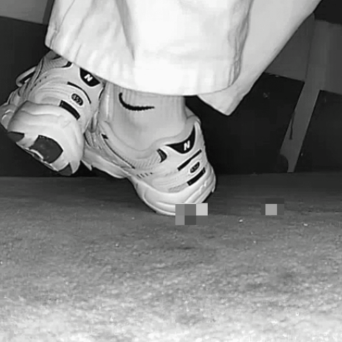 Woman in New Balance sneakers candid crush at the cinema