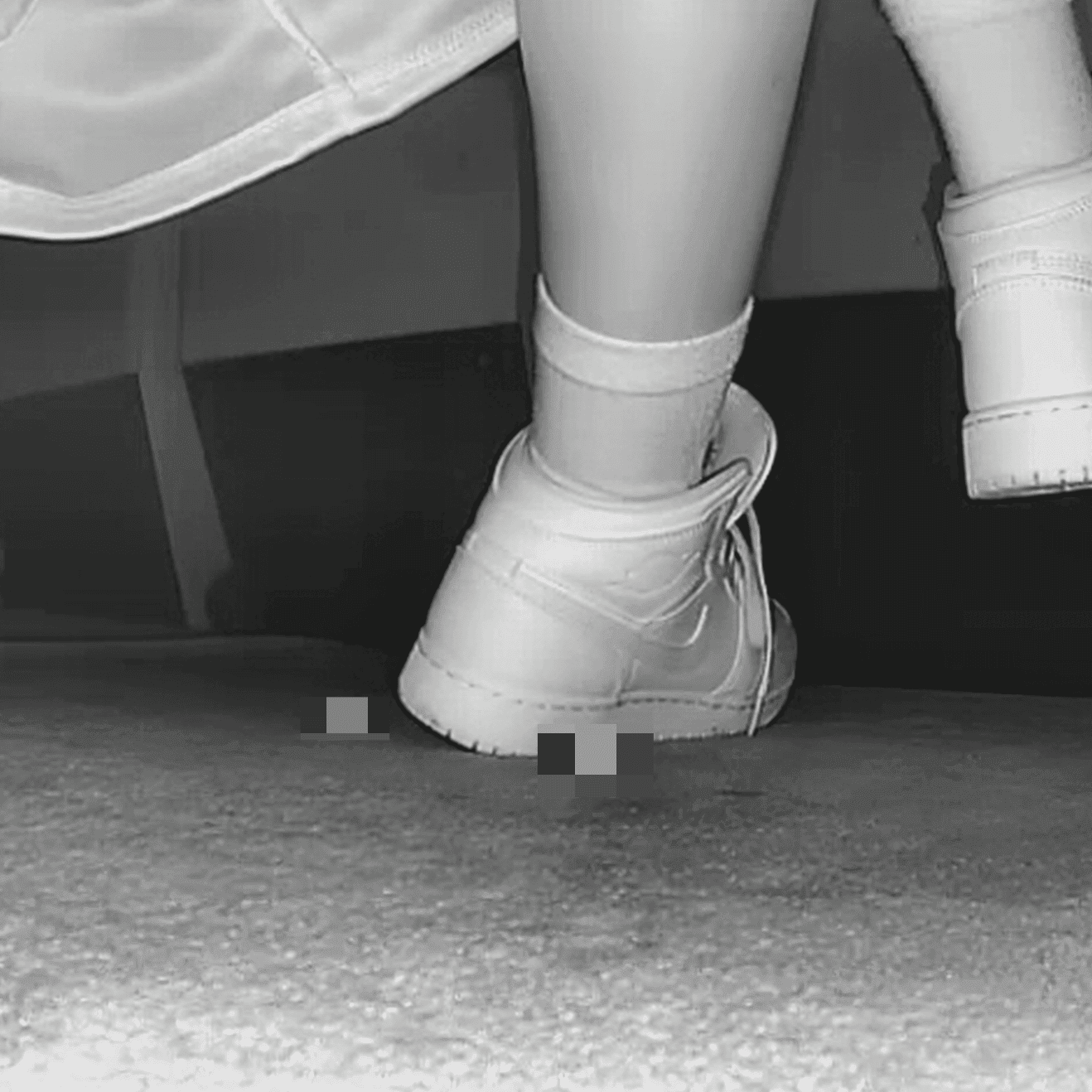Woman at cinema with white high-top Nike Air Jordan sneakers candid crush