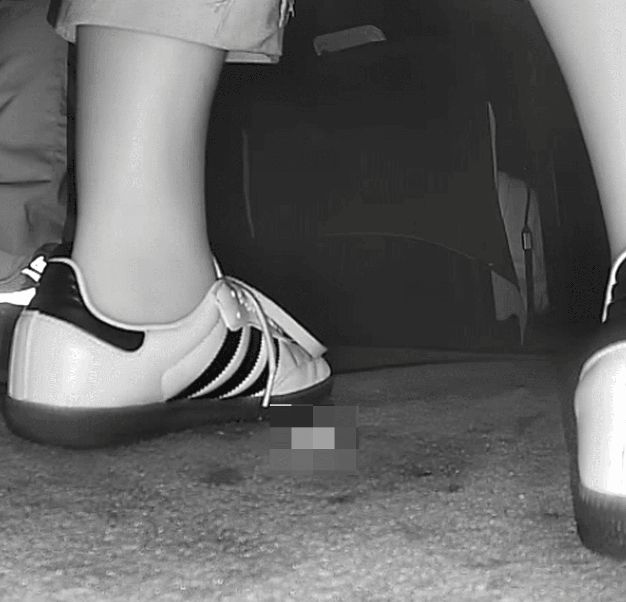 Woman in Adidas Samba sneaker candid crush in movie theater