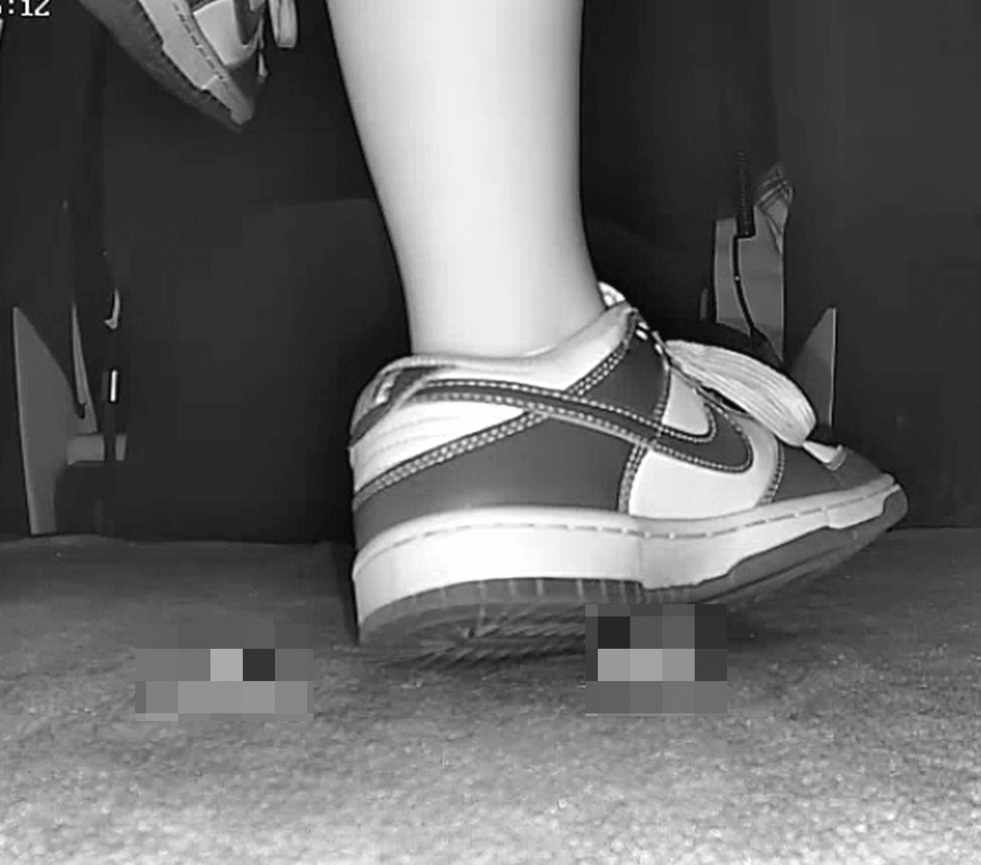 Girl at movie theater candid crush with Nike Dunks sneaker
