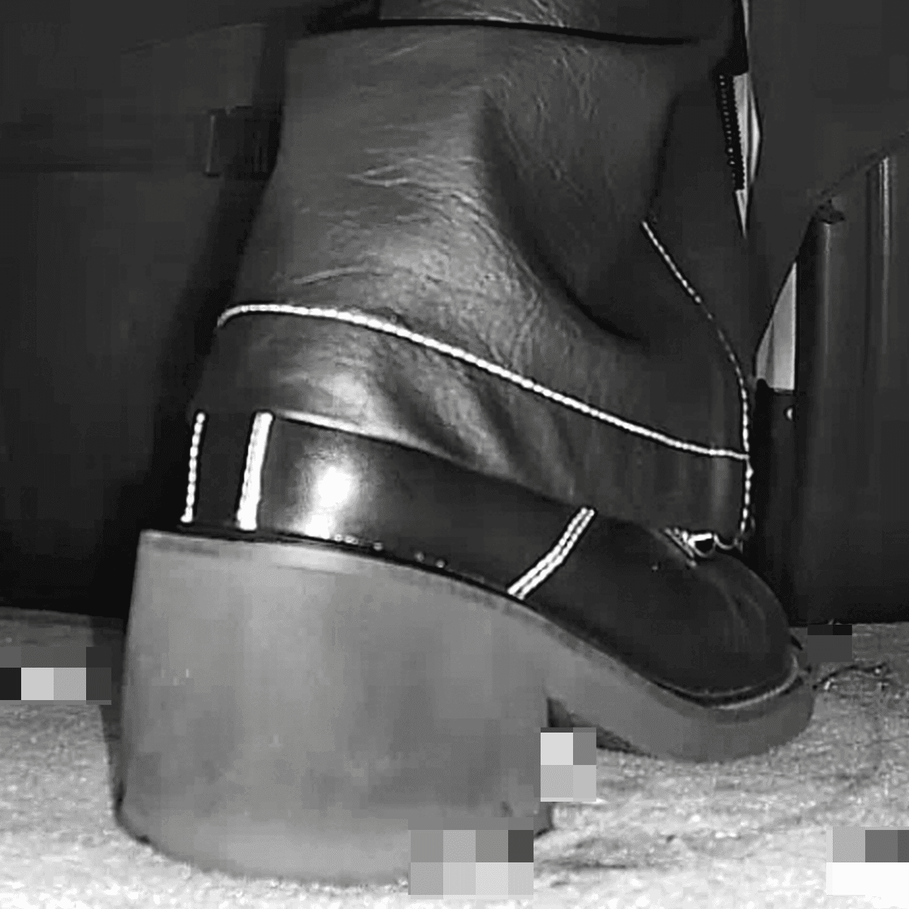 Woman in cinema candid crush with block-heeled boots