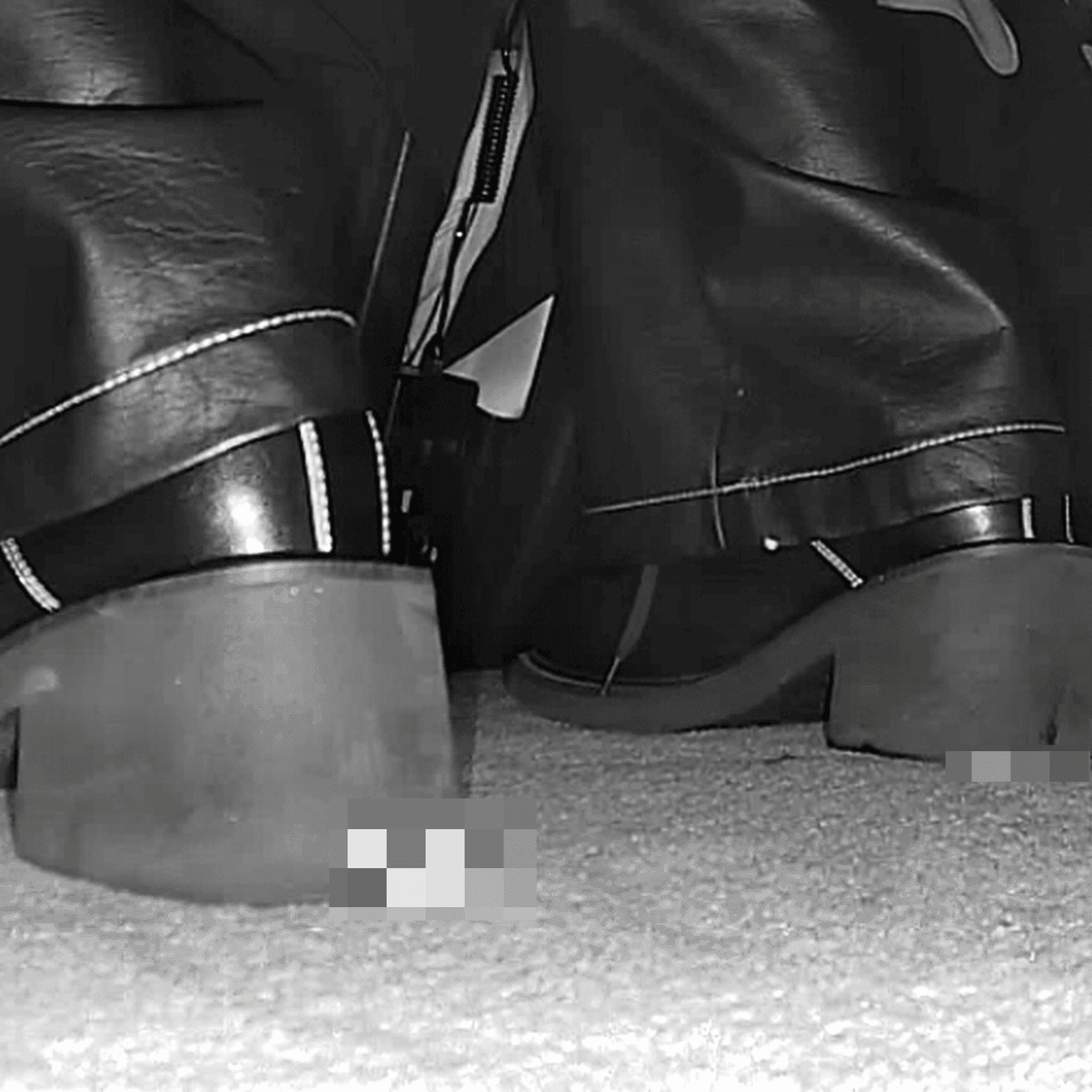 Woman in cinema candid crush with block-heeled boots