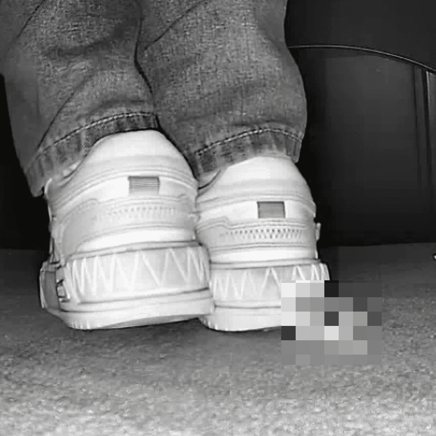 Young woman in cinema candid crush with white sneakers